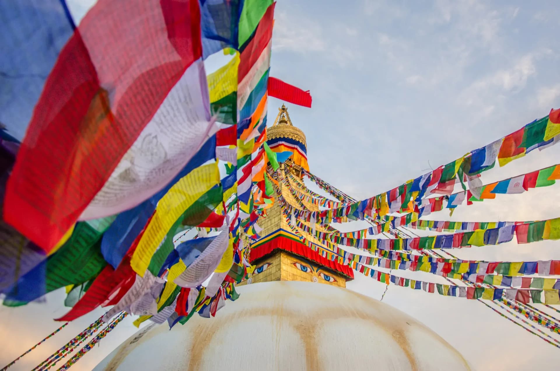 Prayer flags fluttering around Boudhanath Stupa