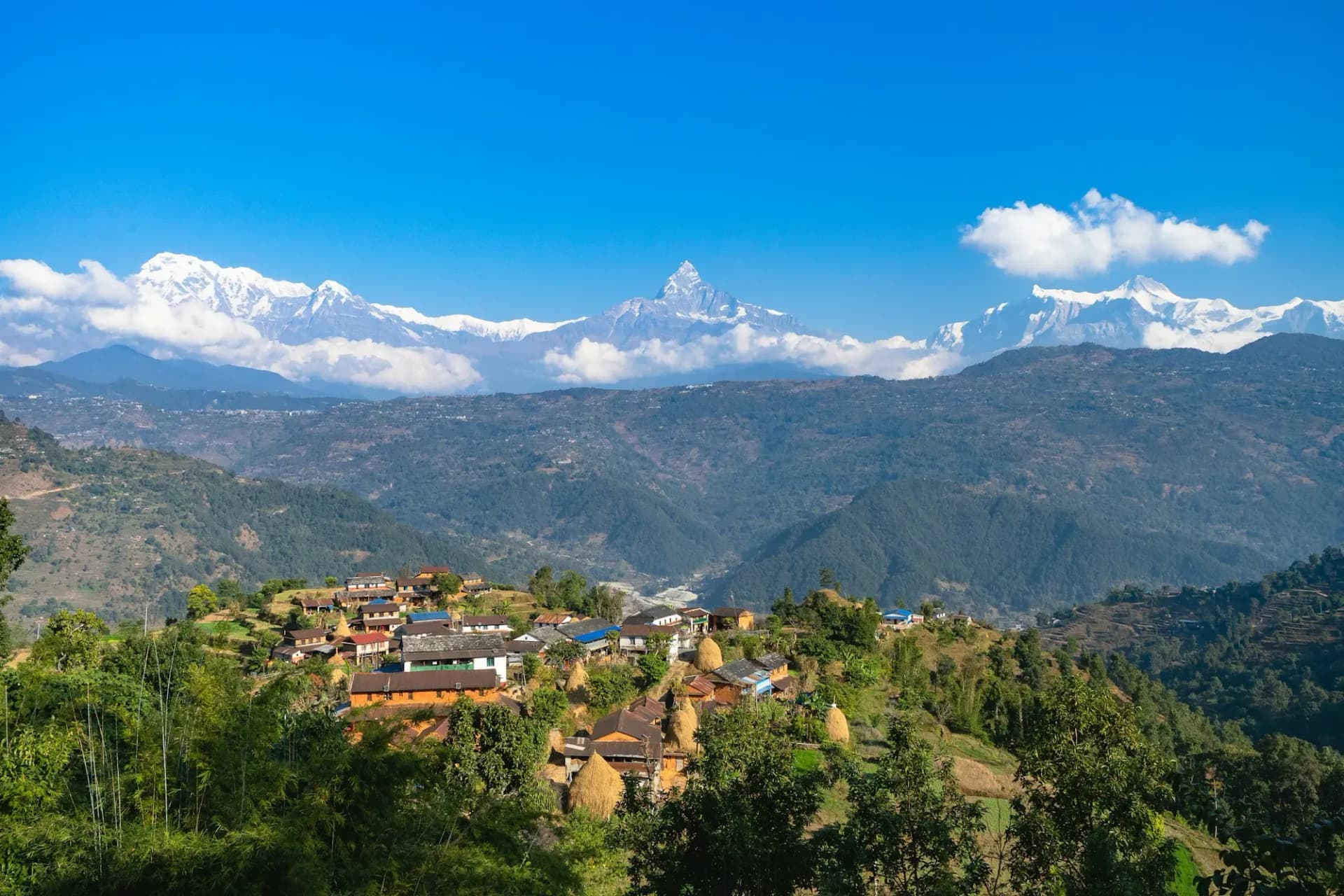 Hillside village facing the Annapurna range and Machhapuchhre on a clear morning