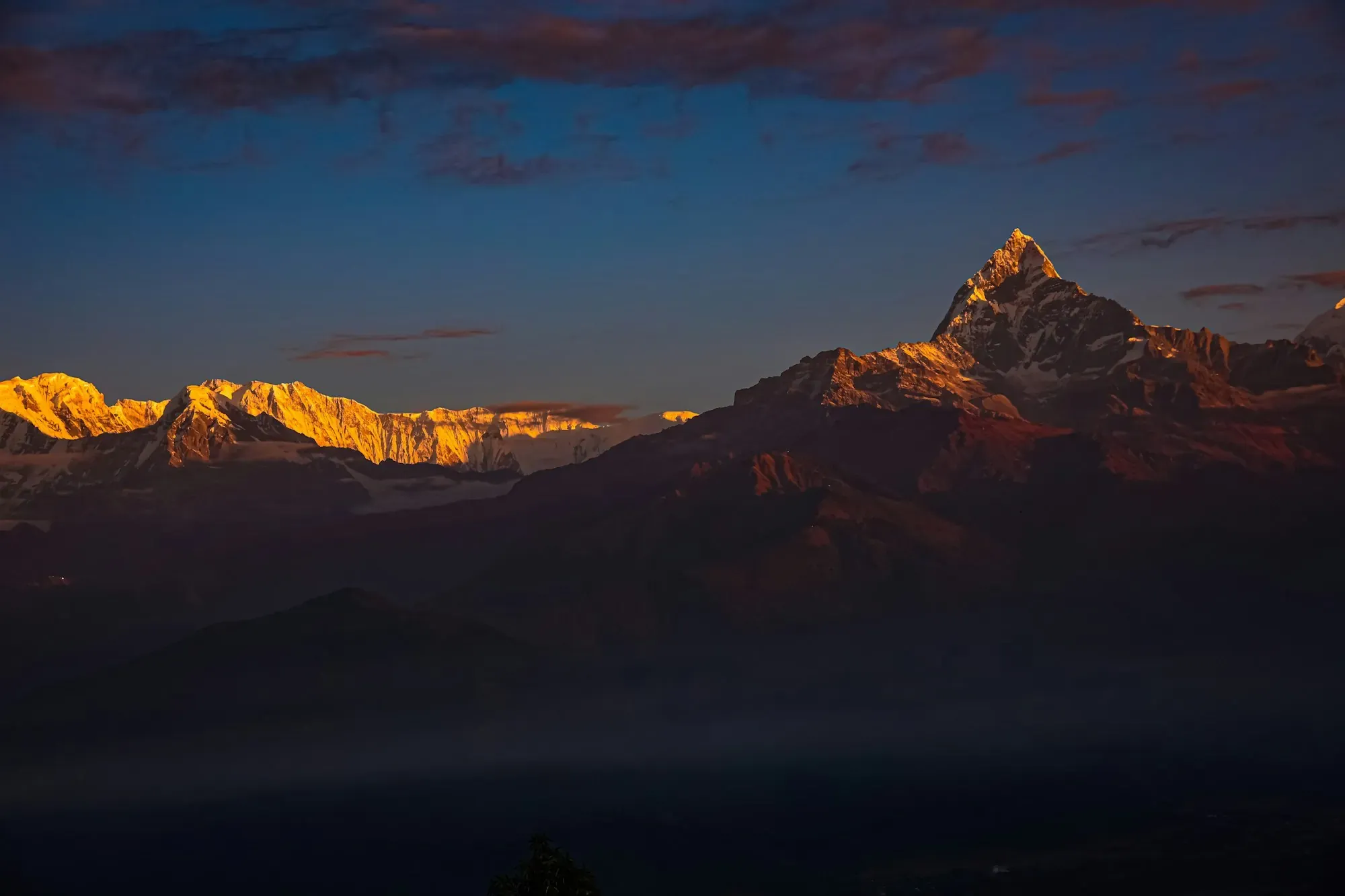 Sunrise glow on Machhapuchhre and the Annapurna range