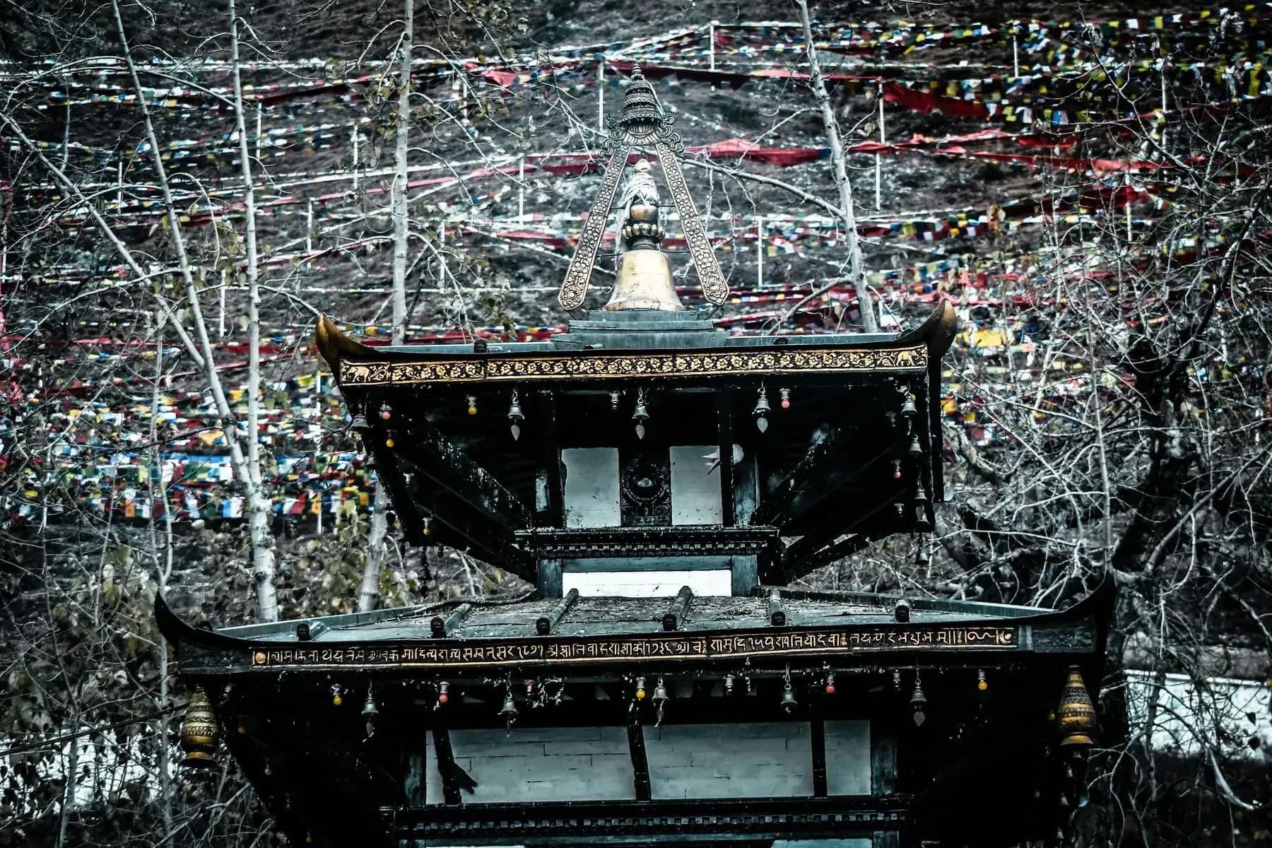Muktinath Temple surrounded by prayer flags, Mustang